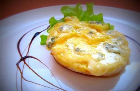Chuletas con piña y queso al horno