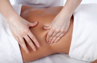 Massagem para emagrecer o abdômen e os lados