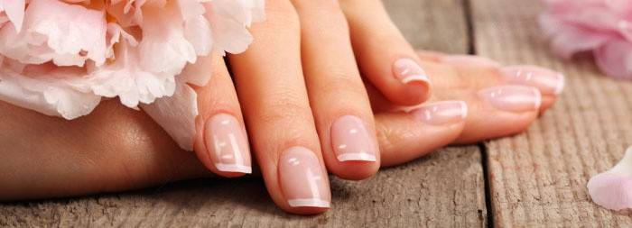 Como são os pontos brancos nas unhas?