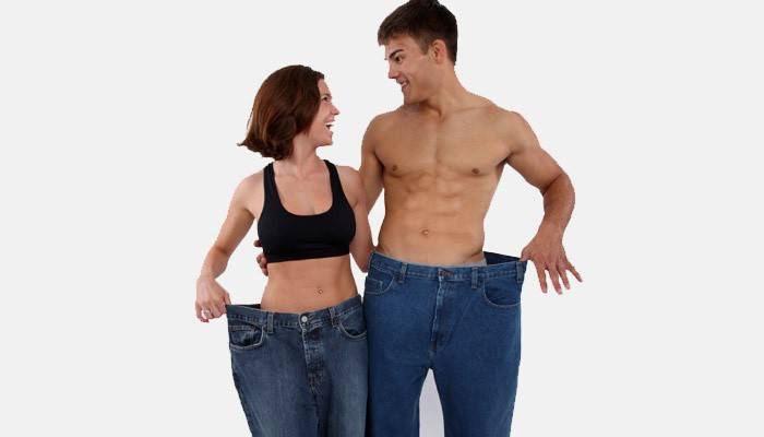Chico y chica después de perder peso