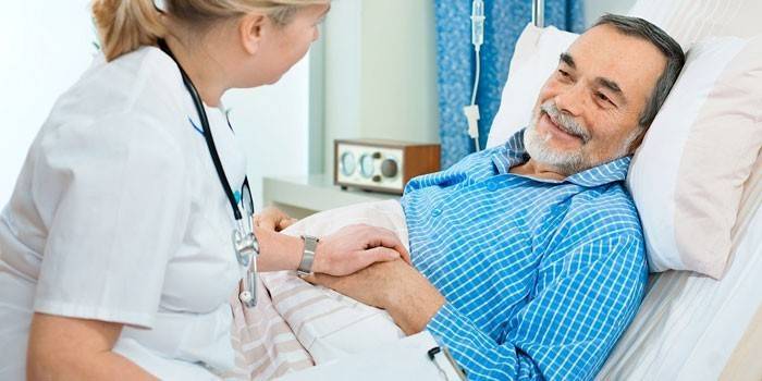 O médico à beira do leito