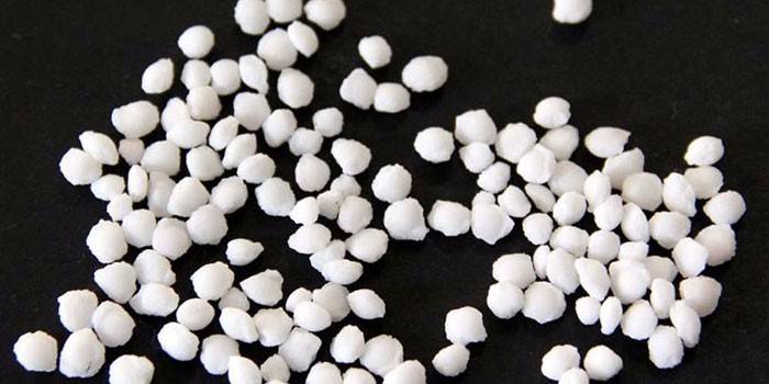 Granule chloridu amónneho