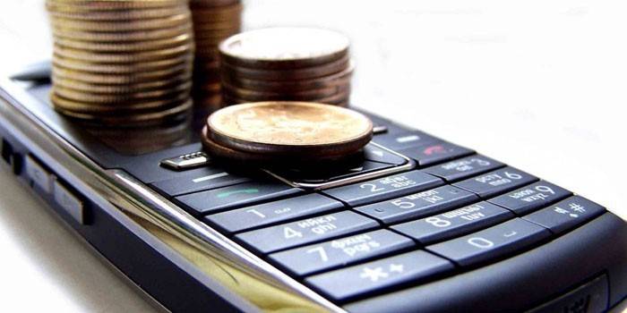 Telefon komórkowy i monety