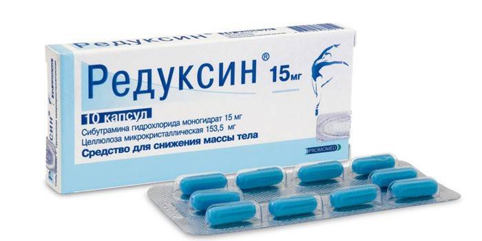 Reduxínové kapsuly v balení