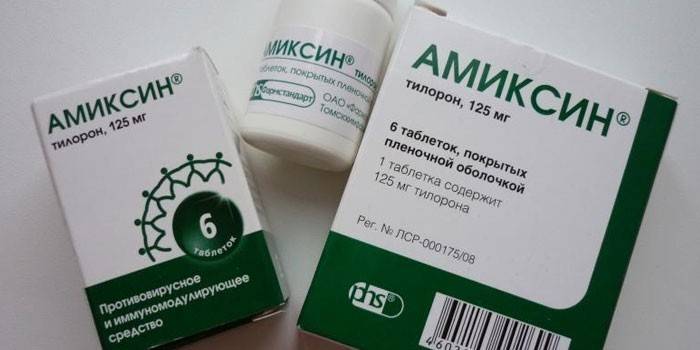 Comprimidos de amixina en diferentes envases.