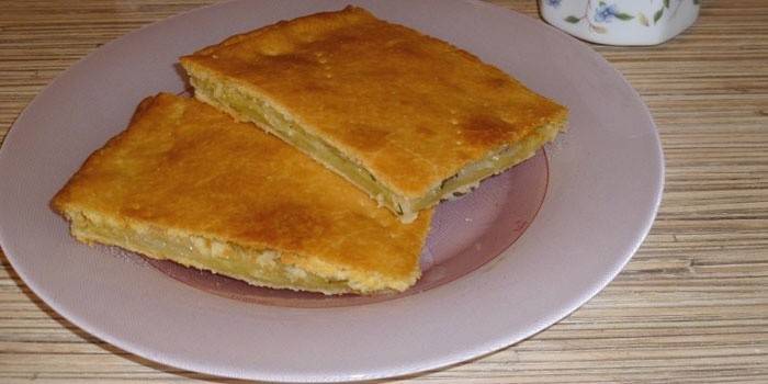 Pastel Rebanado con Patatas y Cebollas