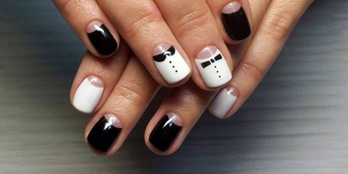 Manicure com esmalte branco e preto
