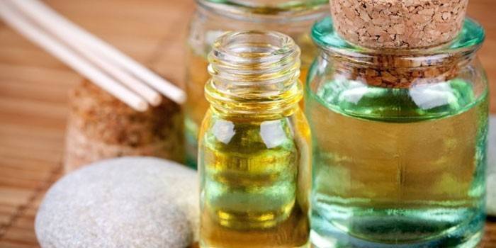 Óleos cosméticos em garrafas