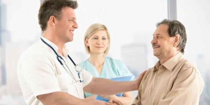 Médicos e paciente