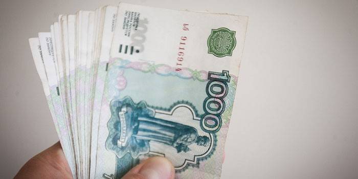 Dinero en mano