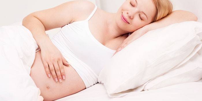 Mulher grávida, dormir