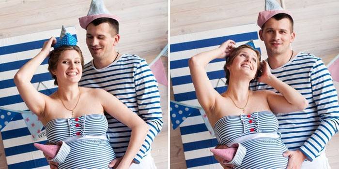 Sessão de fotos marinhas de uma mulher grávida com o marido