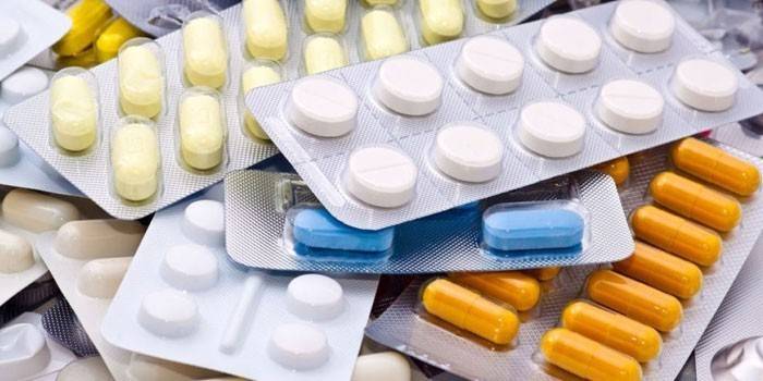Comprimidos e cápsulas em embalagens