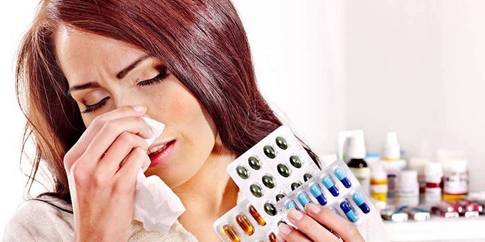 Menina com alergias e medicação.
