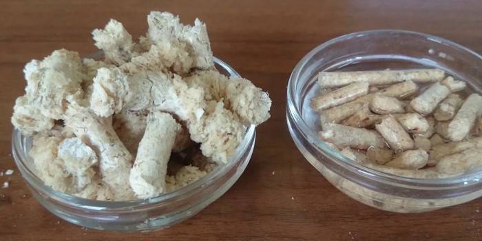 Maca de linho maca de gato em dois recipientes