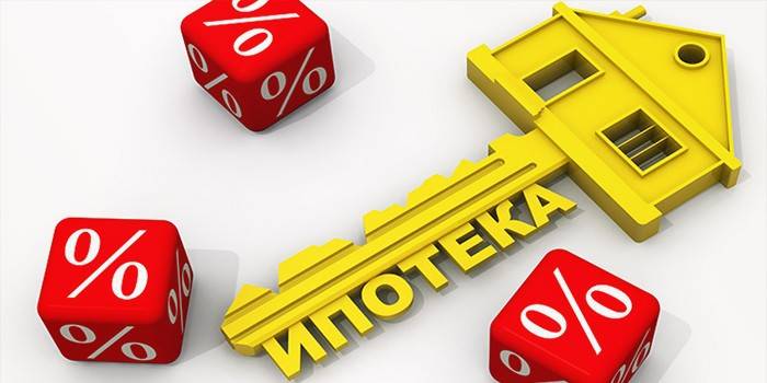 Cubos con icono de porcentaje y clave con la palabra Hipoteca.
