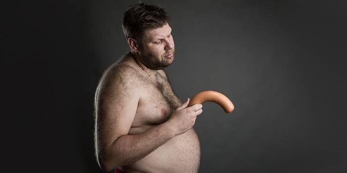 Um, homem, com, um, linguiça, em, seu, mão