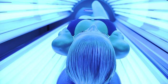 Mujer en el solarium