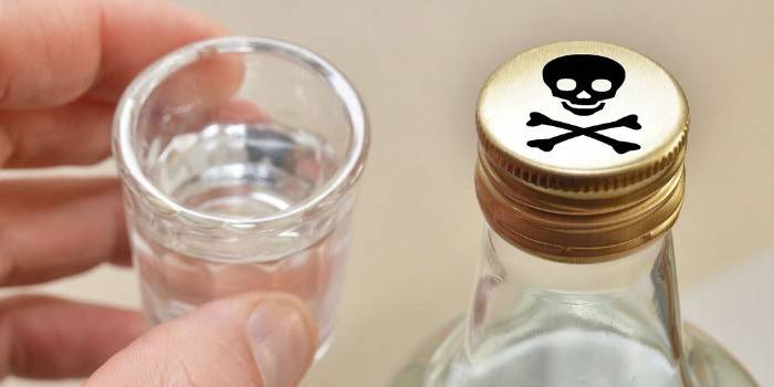 Stoh alkoholu a fľaša jedu