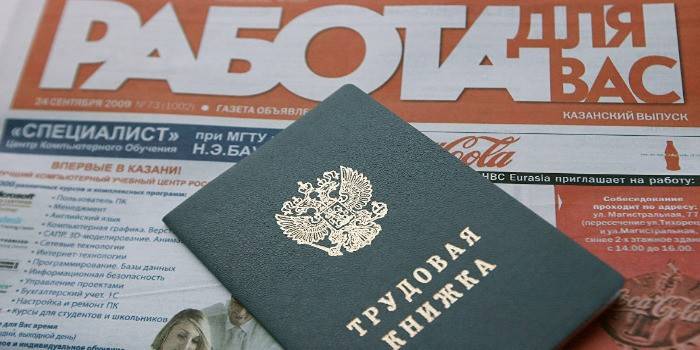 Periódico sobre trabajo y libro de trabajo